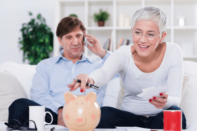 Woman budgeting for dental implants